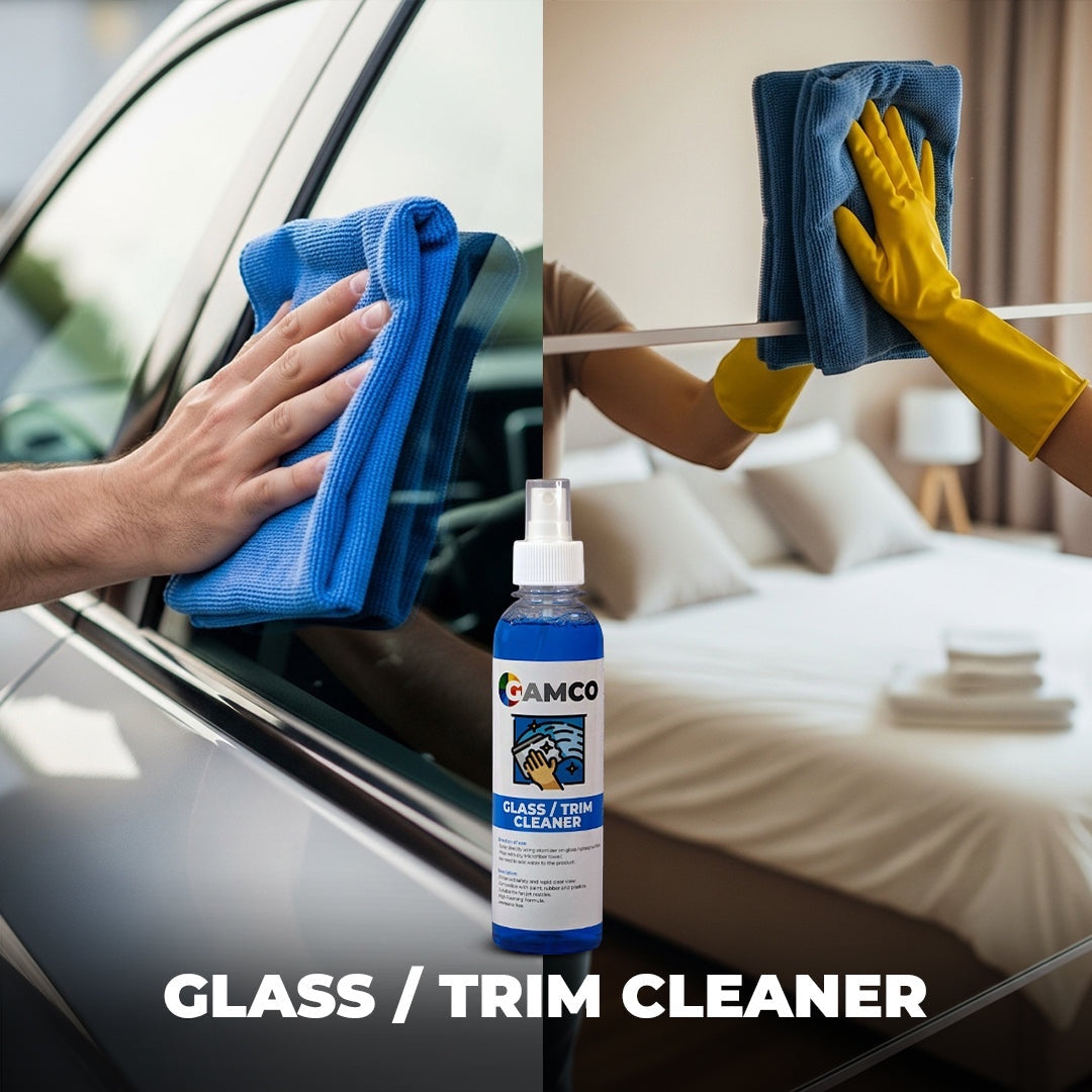 GAMCO Store Glass and Trim Cleaner spray bottle with blue microfiber cloths cleaning car window and mirror. Streak-free finish.