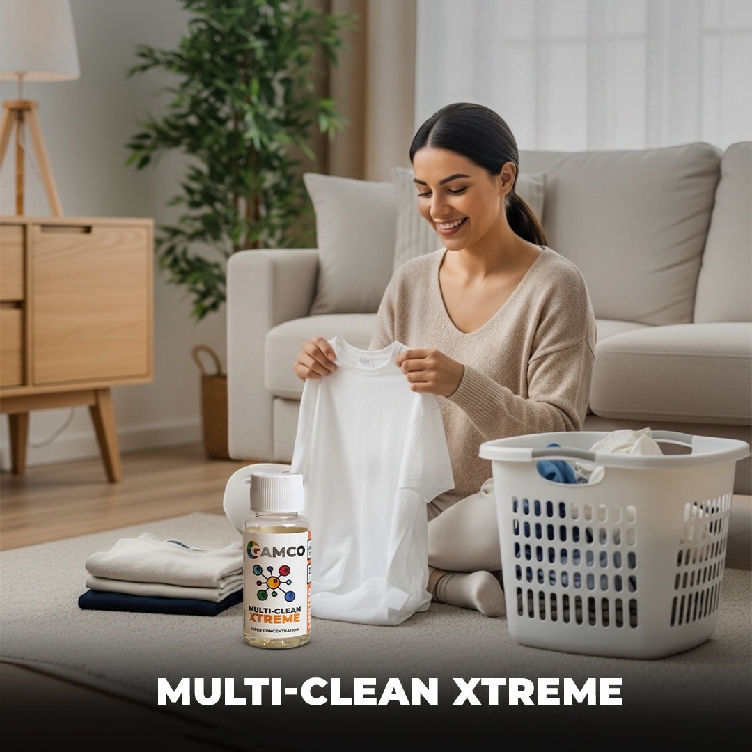 GAMCO Store Multi-Clean Xtreme ultra-concentrated fabric and leather cleaner bottle next to folded clothes and laundry basket.