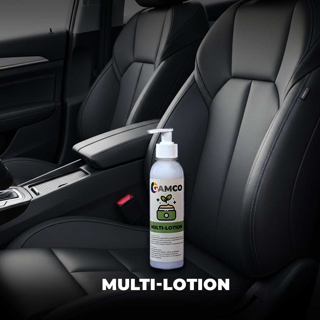 GAMCO Store Multi-Lotion bottle placed on black leather car seats, designed for nourishing and protecting various materials.