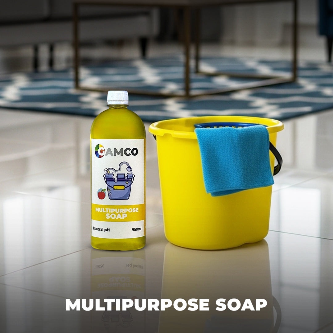 GAMCO Store Multipurpose Soap bottle next to a yellow cleaning bucket with a blue cloth. Neutral pH, 950ml.
