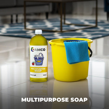 GAMCO Store Multipurpose Soap bottle next to a yellow cleaning bucket with a blue cloth. Neutral pH, 950ml.