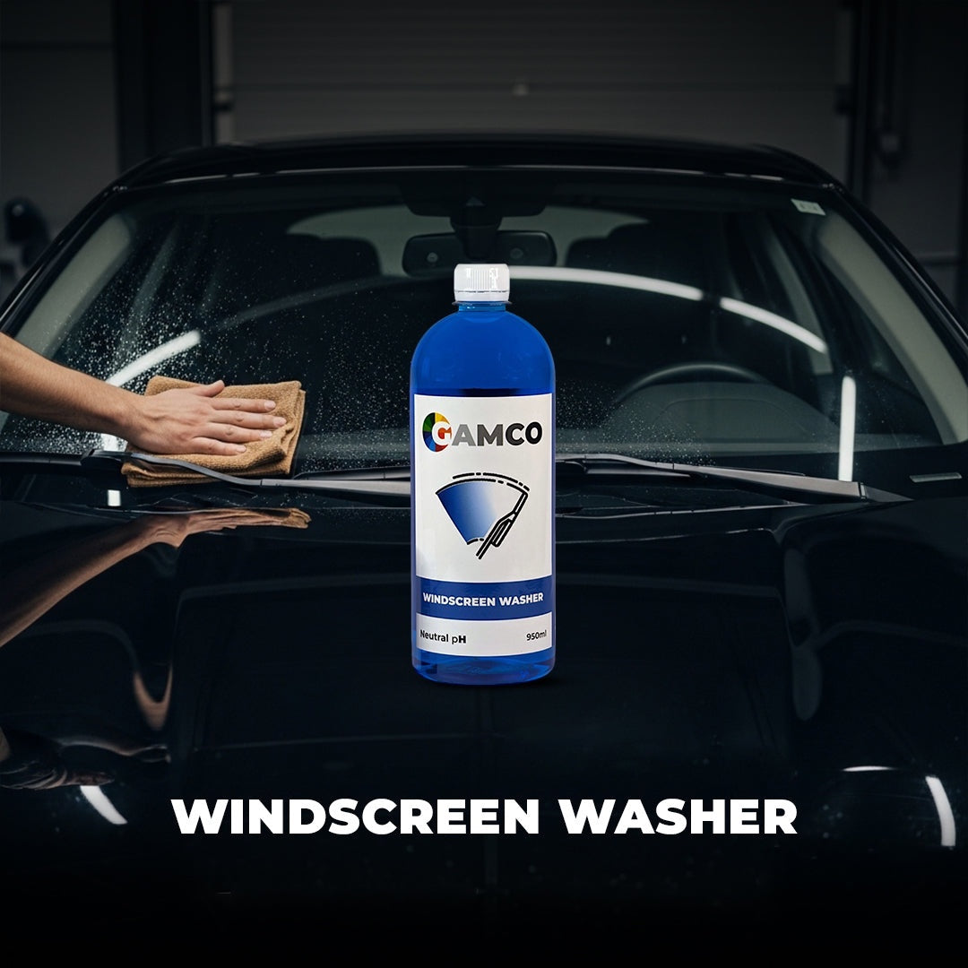 GAMCO Store 950ml bottle of blue windscreen washer fluid, premixed for cars. A hand wipes a car windshield with a cloth.